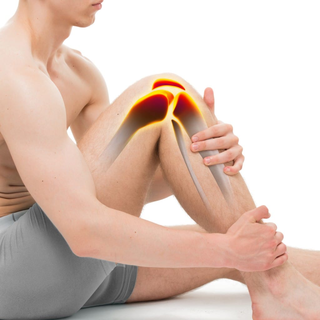 Eine Person mit schmerzen im Knie durch Meniskusläsion